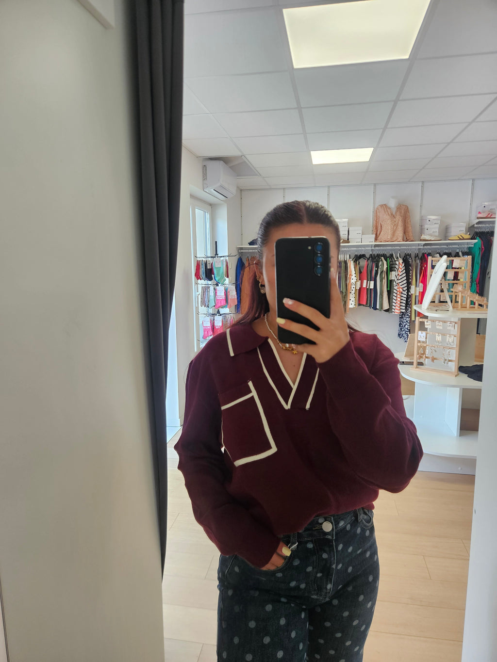 Pull col V poche devant