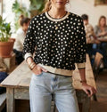 Pull à pois noir